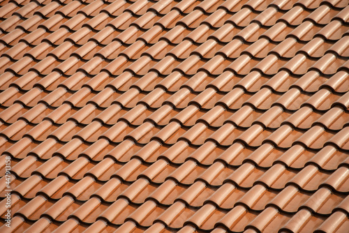 Repetitive pattern of orange roof tile  (ID: 447913158)