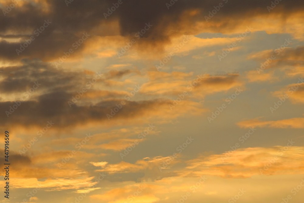 sky and golden clouds at sunset