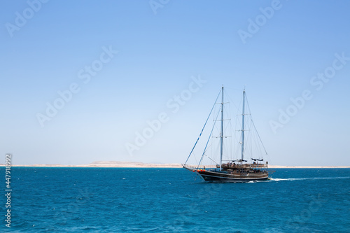Pleasure yacht in the blue sea