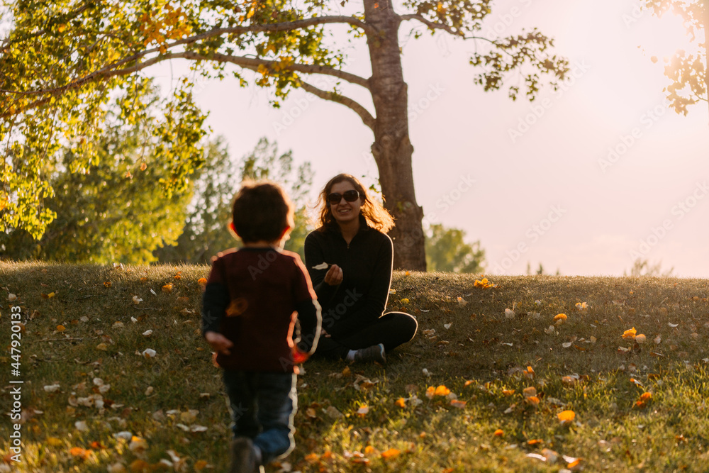 Mother and son enjoying time together at a park Mother and son enjoying time together at a park