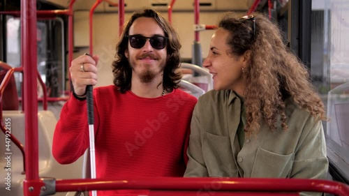 Wallpaper Mural assistance, support - young woman speaks with his blind friend on the bus Torontodigital.ca