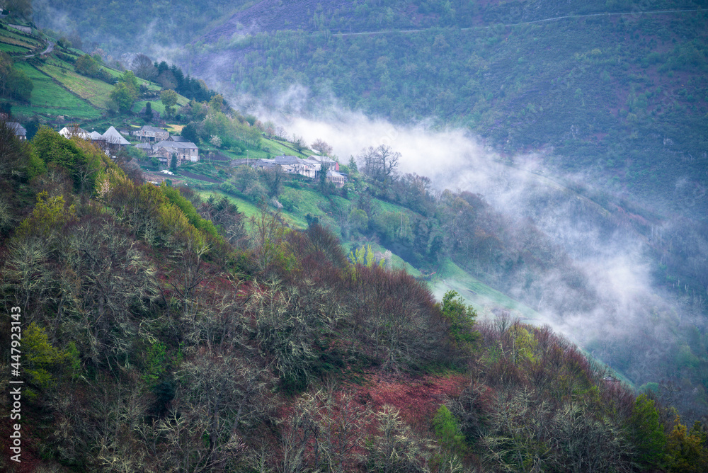 A mountain village wakes up in the mist A mountain village wakes up in the mist