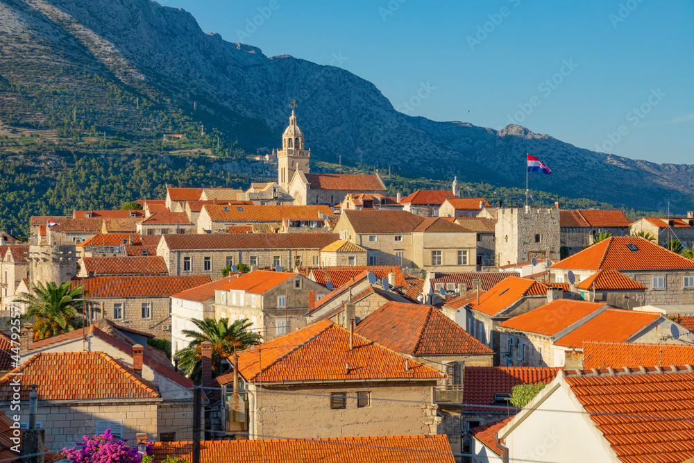 AERIAL: Spectacular flying view of the rooftops of the ancient town of Korcula.