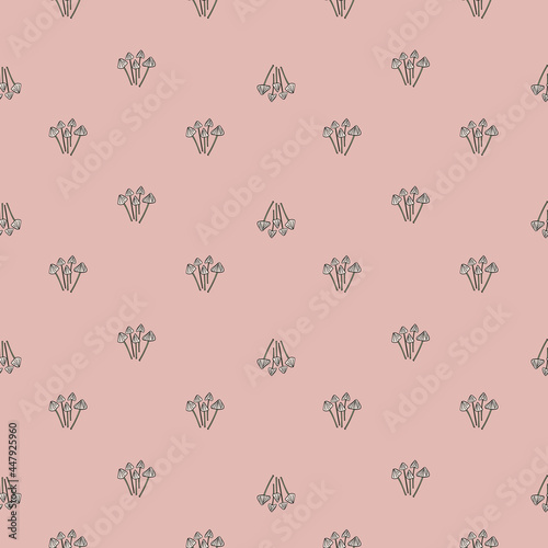 Pastel pink colors seamless pattern with little psilocybe semilanceata mushroom silhouettes. Simple print.