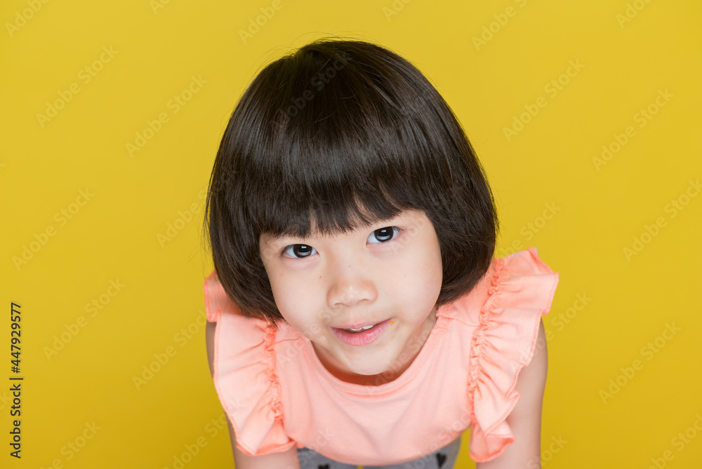 happy kid on yellow background, portrait child
happy kid on yellow background, portrait child