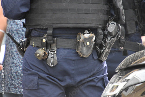 Close-up on the accessories of a policeman