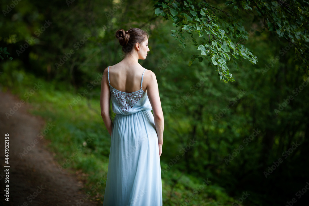 Photographed from the back of a young woman Photographed from the back of a young woman