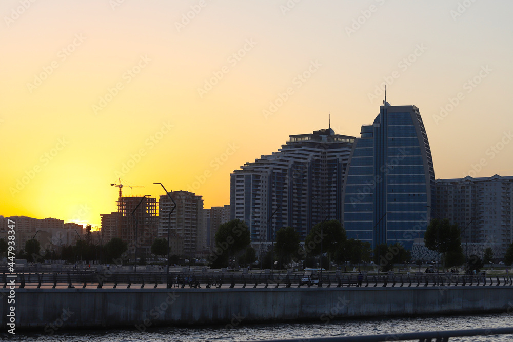 Baku. Azerbaijan. 07.04. 2020. Sunset on the boulevard of the White City. Baku. Azerbaijan. 07.04. 2020. Sunset on the boulevard of the White City.