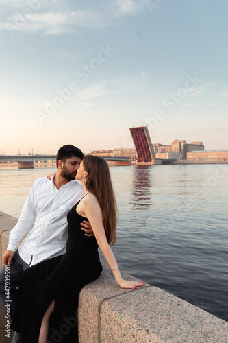 love story of young hindu guy and european beautiful girl at dawn © Anton