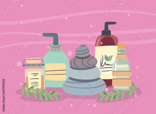Spa center stones and cream bottles
