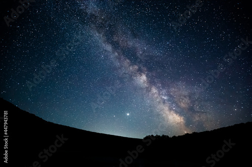 Gorgeous night landscape with bright Milky Way.