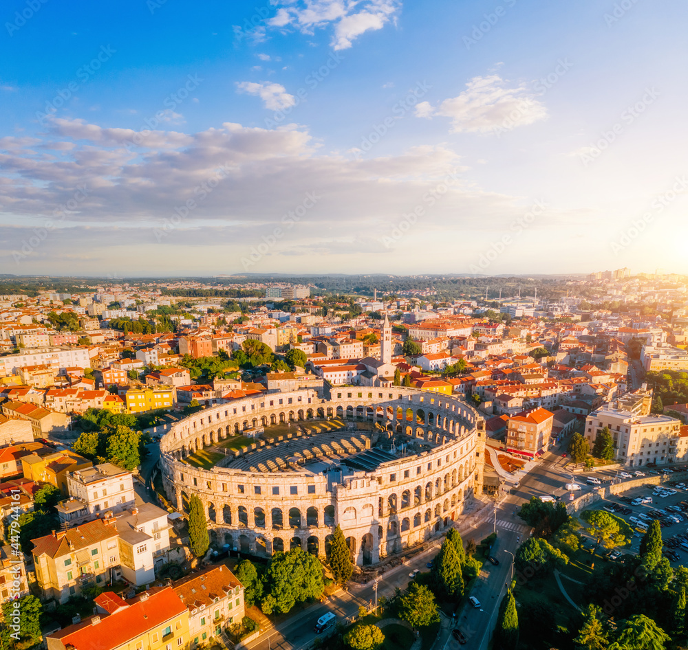 Exotic view at famous european city of Pula and arena of roman time.