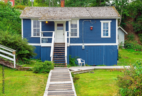 Telegraph Cove housing with wooden chalet architecture and wood panelling, Vancouver Island, British Columbia, Canada. photo