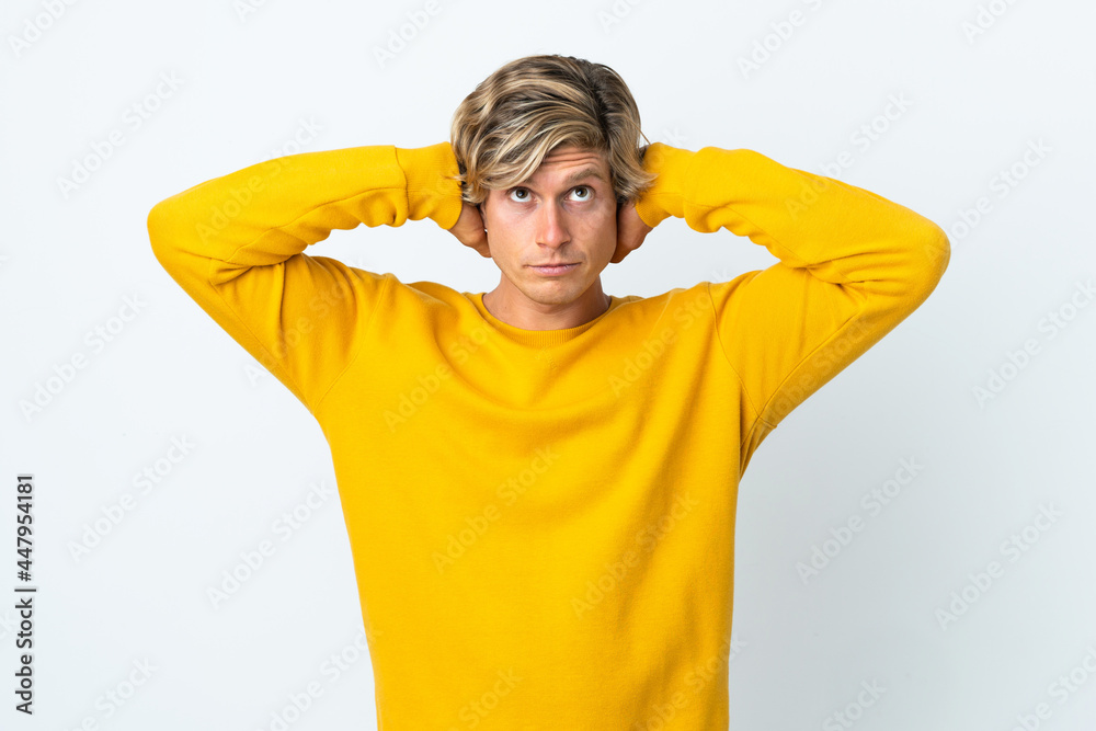 English man over isolated white background frustrated and covering ears English man over isolated white background frustrated and covering ears