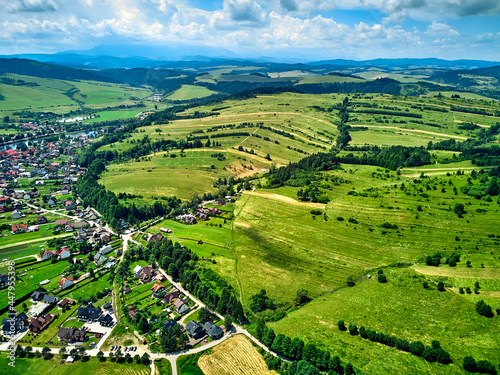 Beautiful aerial panoramic view of the Pieniny National Park, Poland in sunny day. Sokolica and Trzy Korony - English: Three Crowns (the summit of the Three Crowns Massif) and Dunajec river