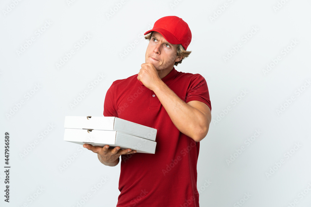 pizza delivery man over isolated white background having doubts and thinking pizza delivery man over isolated white background having doubts and thinking