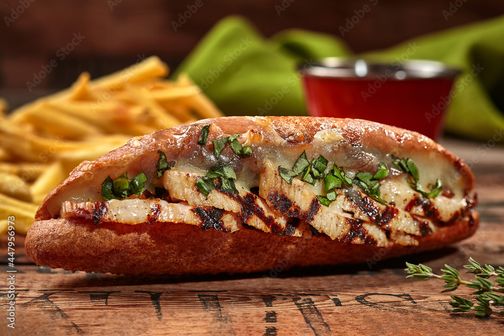 Submarine sandwich from split hoagie roll with pork and cheese Submarine sandwich from split hoagie roll with pork and cheese