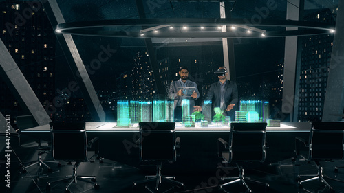 In the Near Future  Professional Designer in Suit wearing AR Headset presenting Architecture Project to Partner standing around Futuristic Table with Holographic Modern Augmented Reality Technology.