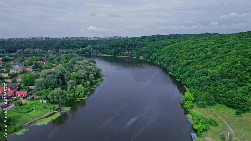 Aerial view of green forest and river Aerial view of green forest and river