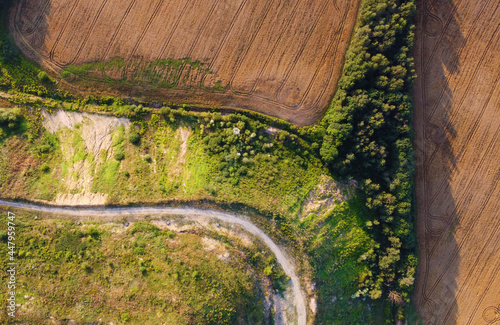 Aerial view of a large green hill in the fields. Ecology pollution garbage landfill