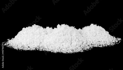 Heap of white snow on a black background, close up. Snowdrift.