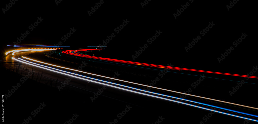 night highway, long exposure of cars lights on the night road