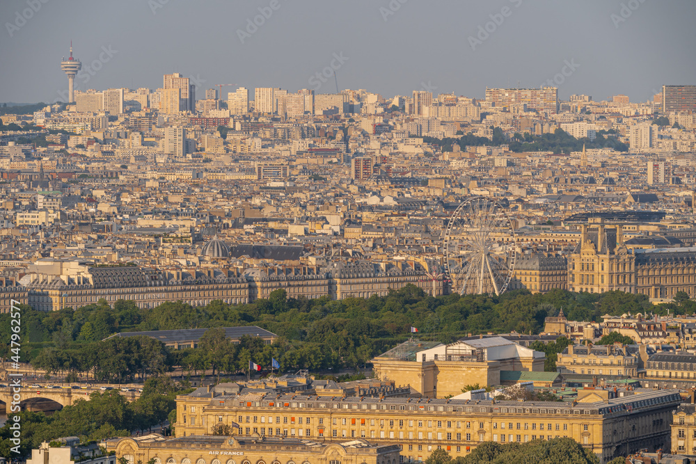 Paris, France - 07 22 2021: Eiffel Tower: View of Louvre Museum at sunset in Paris