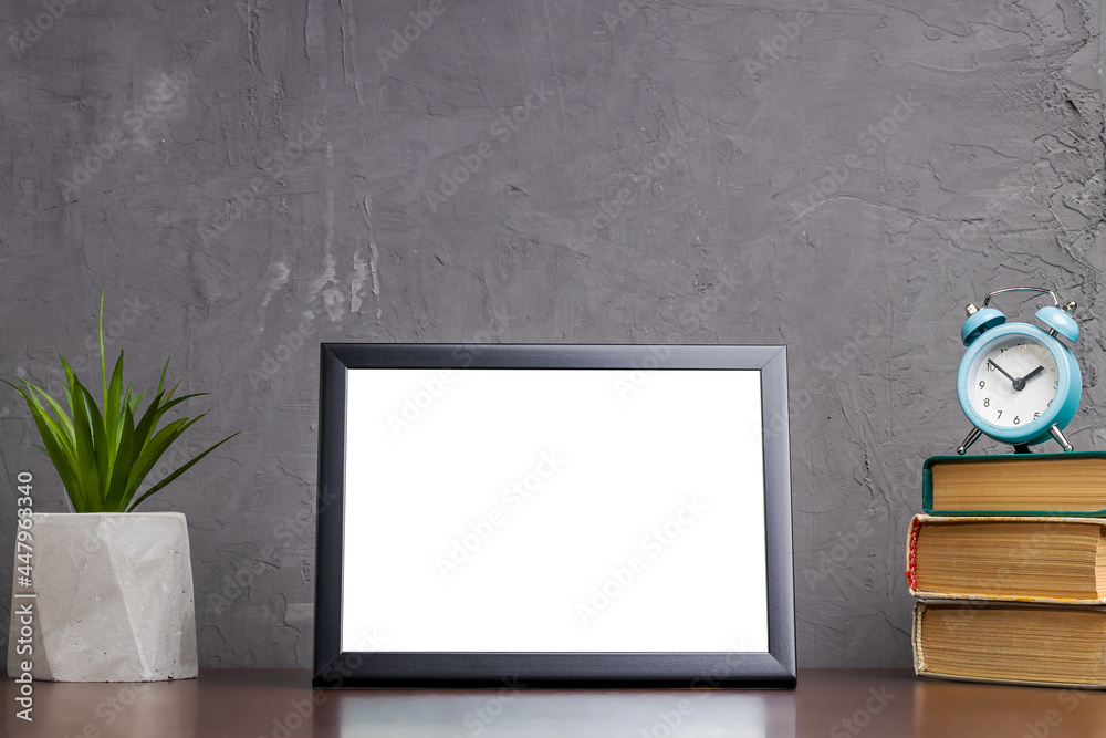 Fototapeta premium back to school concept. desk with stationery supply over concrete wall background. copy space. background backdrop
