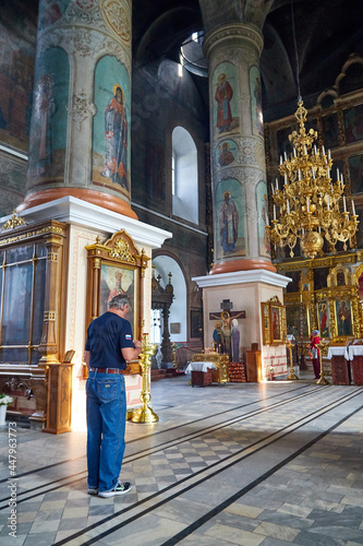 Slobodskoy, Russia - August 31, 2020: The interior of a traditional Christian Orthodox Russian church. The temple is inside with icons and an iconostasis photo