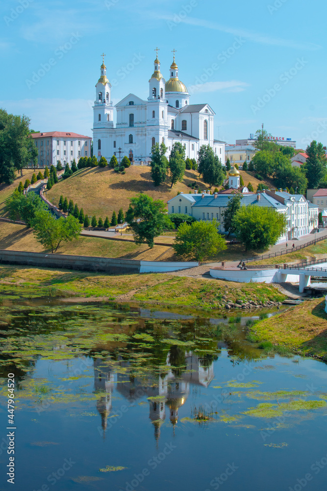 Vitebsk, Belarus- July 16, 2021: Holy Assumption Cathedral of the Assumption on the hill and the Holy Spirit convent and Western Dvina River