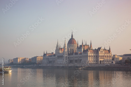 Hungarian parliament building in fog at sunrise in Budapest © Evgeniya Biriukova