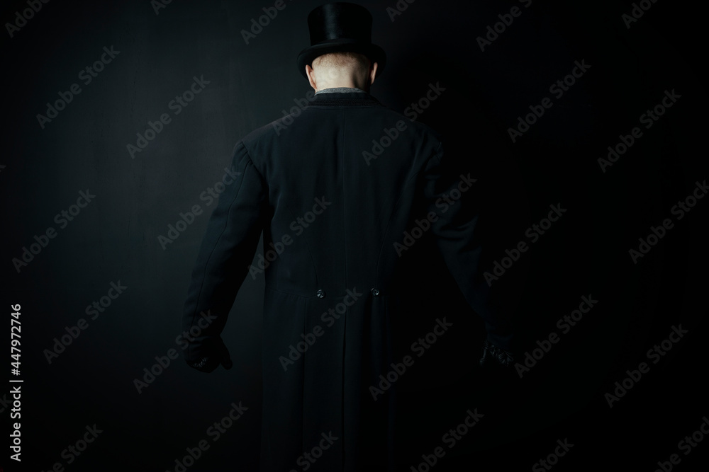 Working class or gangster Victorian man wearing a top hat