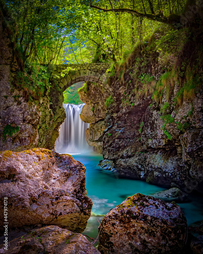 Ancient roman bridge over repepeit river, Friuli Italy photo