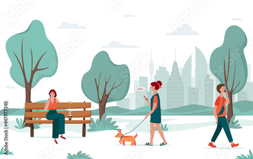 Outdoor activity. Young people walking in the city park. Girl with a dog, young man, young woman with phone on a bench. Urban recreation concept