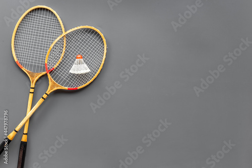 Two rackets and shuttlecock for playing badminton, top view © 9dreamstudio