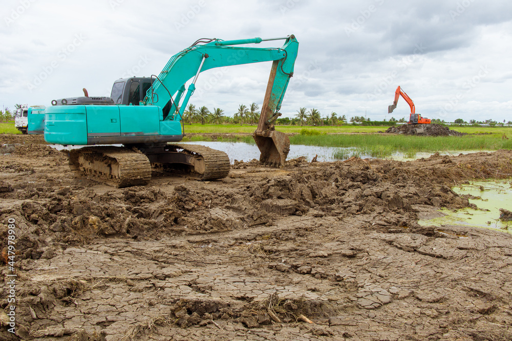 Obraz premium backhoe tractor working in the field