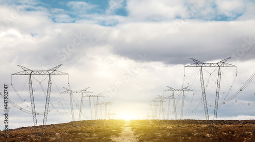 power lines in the field. Energy future concept