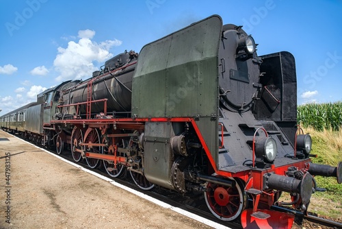 Old locomotive on the rural railway 