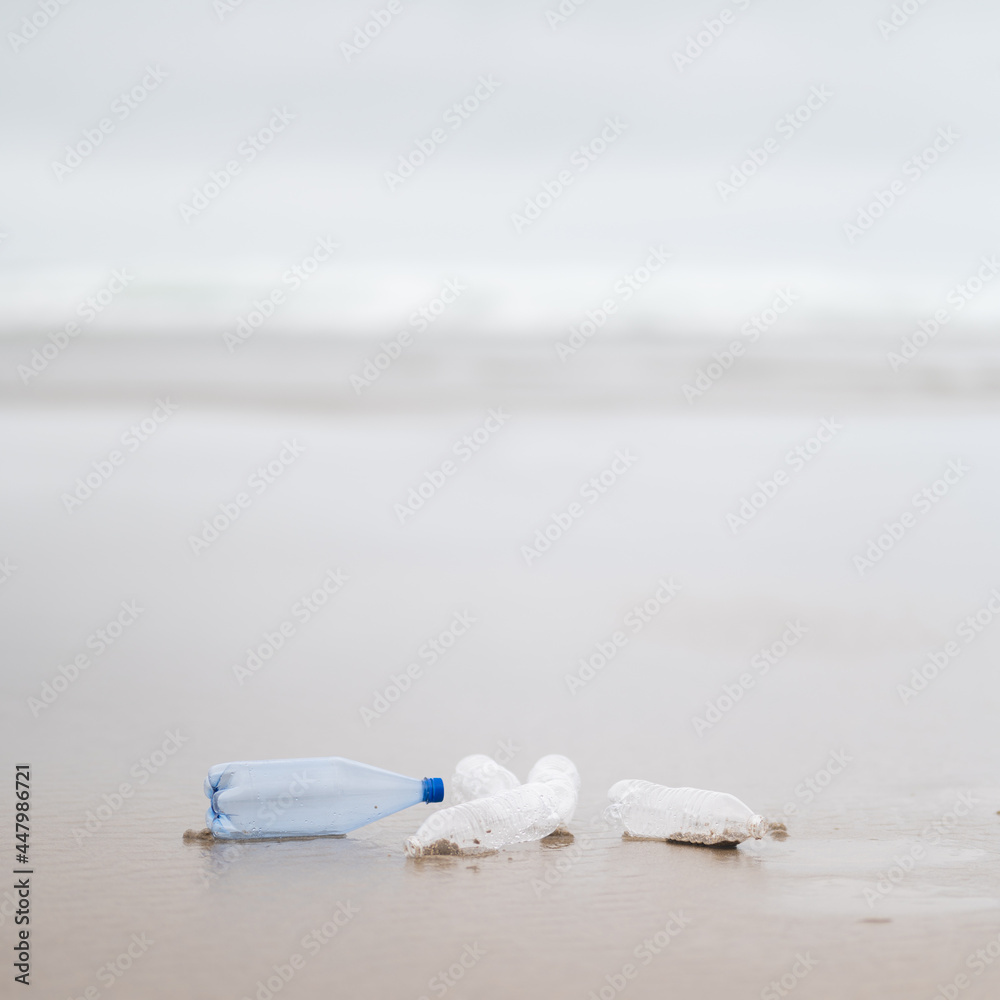 Environmental protection. Waste recycling. Social problems. Plastic water bottles on the ocean. Blurred background. Light background. There are no people in the photo. Environmental protection. Waste recycling. Social problems. Plastic water bottles on the ocean. Blurred background. Light background. There are no people in the photo.