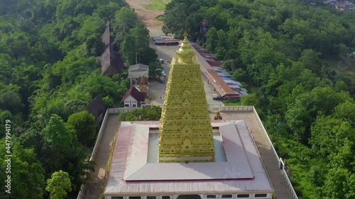 Chedi Phutthakhaya or Puttakaya Pagoda, Wat wang Wiwekaram or wat luang pho uttama in Sangkhlaburi, Kanchanaburi, Thailand photo