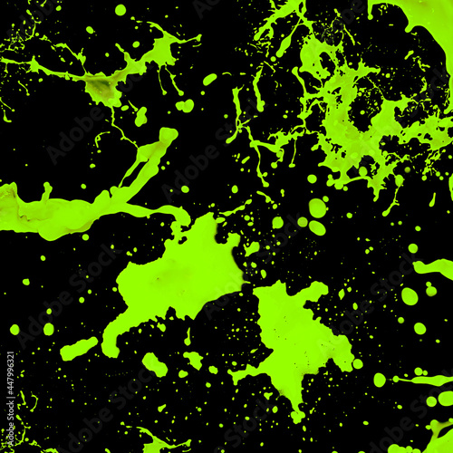 Vibrant Neon Green Splatter on Black Background.