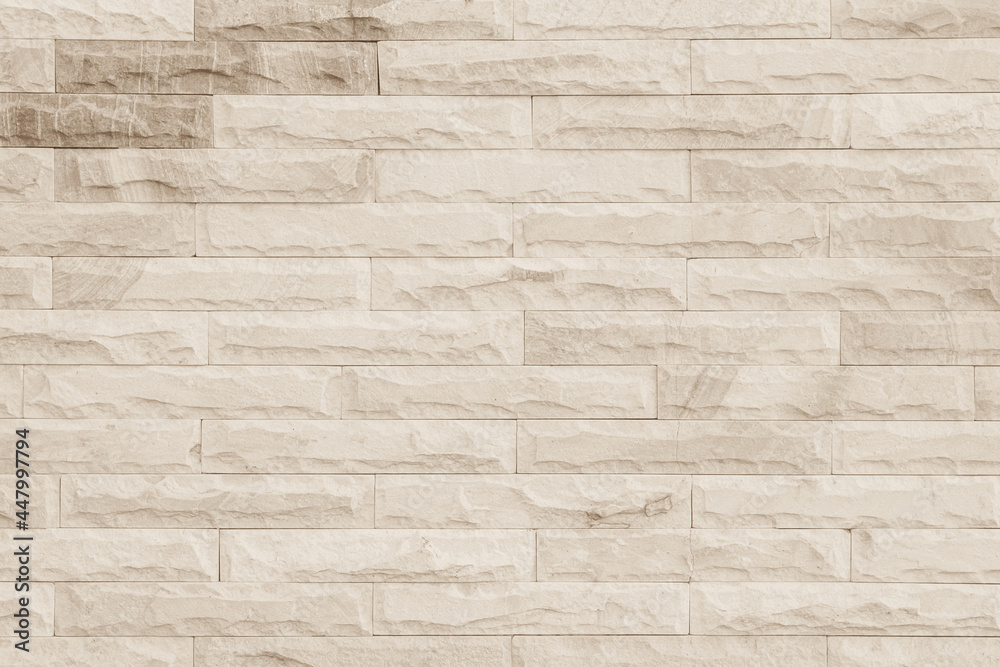 Empty background of wide cream brick wall texture. Beige old brown brick wall concrete or stone textured. Empty background of wide cream brick wall texture. Beige old brown brick wall concrete or stone textured.