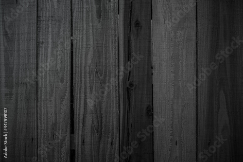 Grunge dark wood plank texture background. Vintage black wooden board wall antique cracking old style 