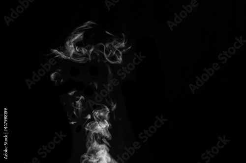 Fototapeta Naklejka Na Ścianę i Meble -  White smoke on black background. Figured smoke on a dark background. Abstract background, design element