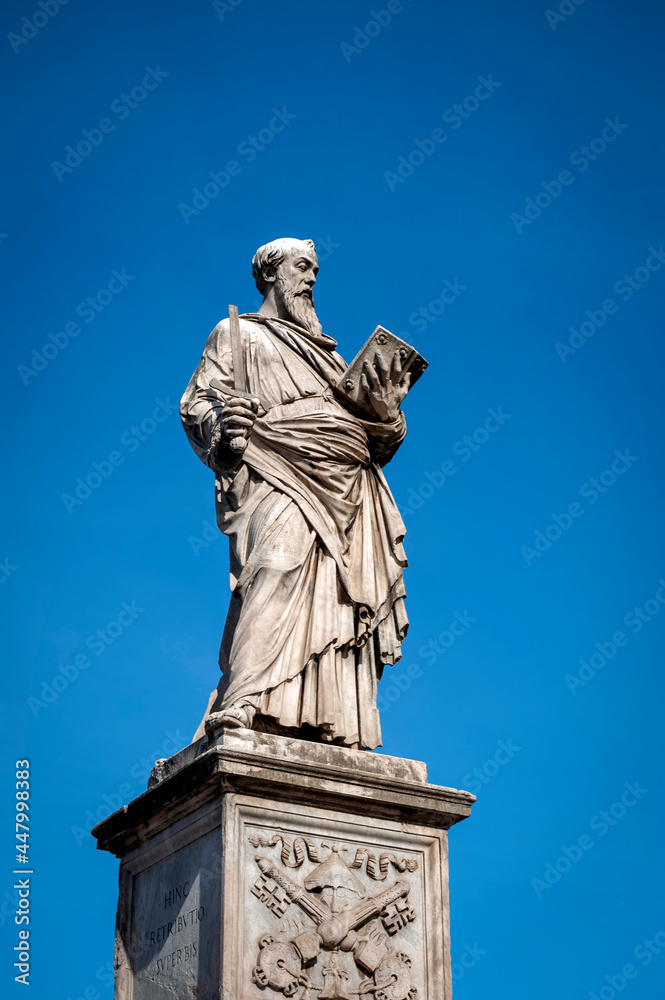 Statue of St. Paul by Paolo Romano with the inscription at Castel Sant'Angelo (Castle of the Holy Angel) or The Mausoleum of Hadrian in Rome, Italy