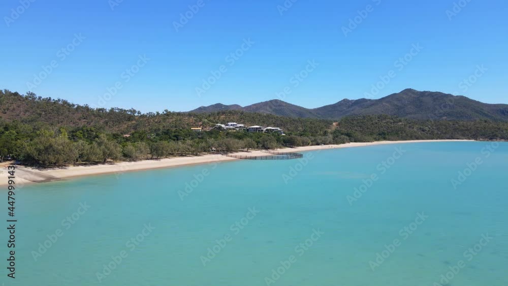 Distant View Of The Fence At The Oceanfront Of Dingo Beach In North Queensland, Australia. aerial Distant View Of The Fence At The Oceanfront Of Dingo Beach In North Queensland, Australia. aerial