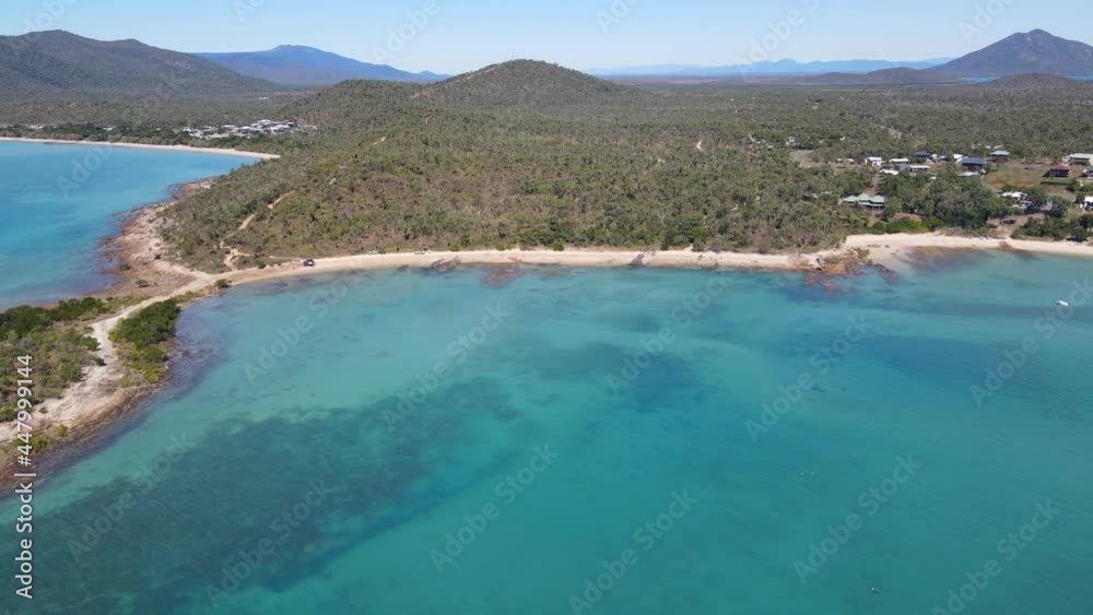 Panoramic View Of The Lush Forest In Hideaway Bay Town And Blackcurrant Island In Australian State Of Queensland. aerial Panoramic View Of The Lush Forest In Hideaway Bay Town And Blackcurrant Island In Australian State Of Queensland. aerial