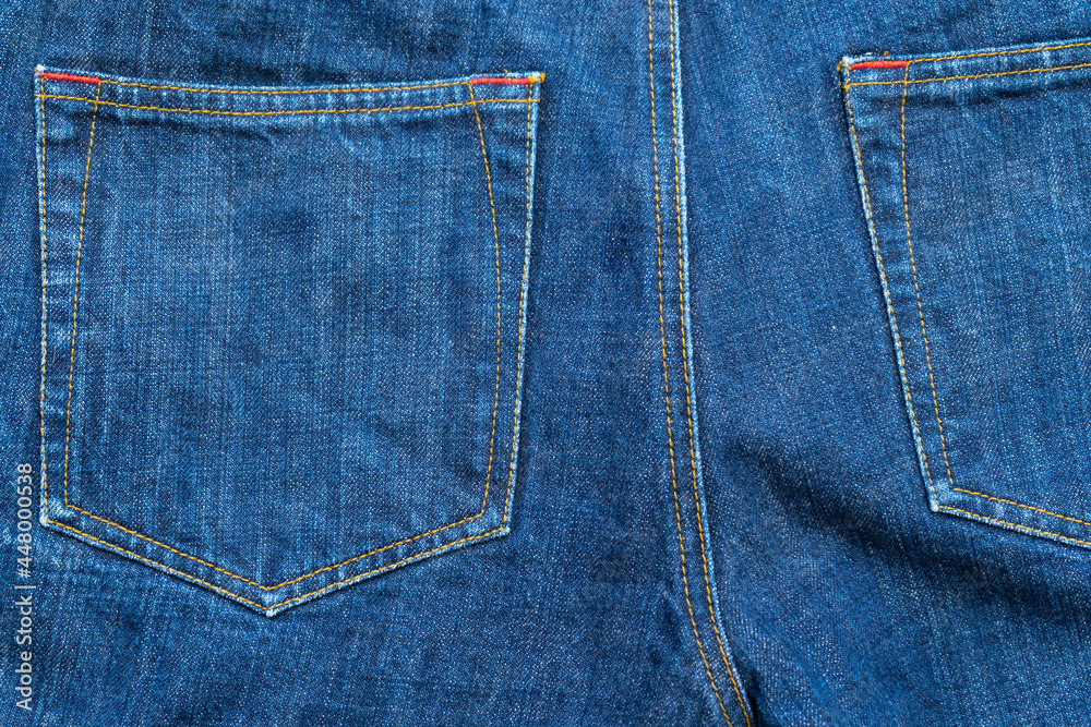 Blue Jeans and bleached background,denim with seam of fashion design with pocket. Blue Jeans and bleached background,denim with seam of fashion design with pocket.