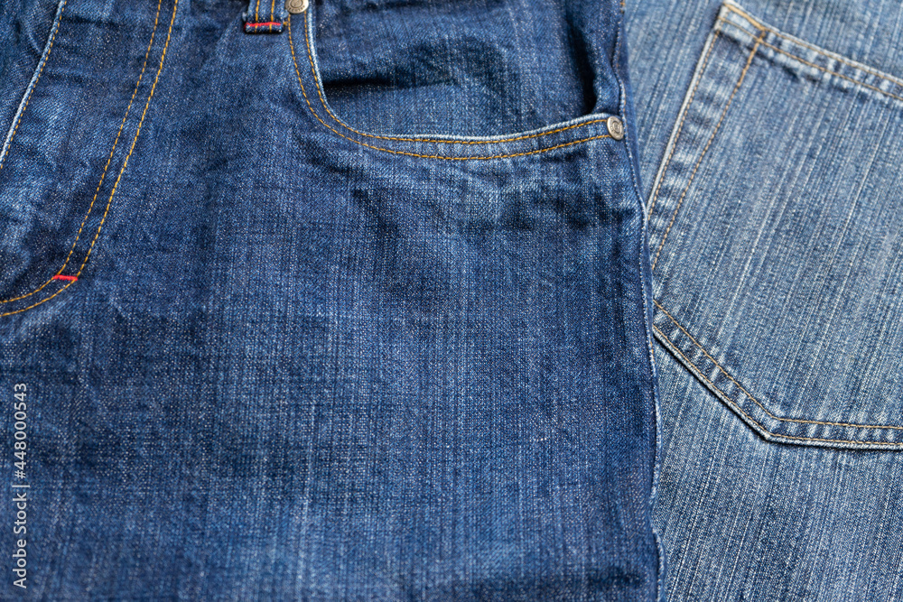 Blue Jeans and bleached background,denim with seam of fashion design with pocket. Blue Jeans and bleached background,denim with seam of fashion design with pocket.