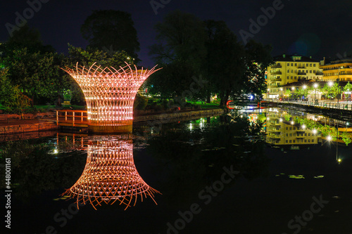 Boras, Sweden July 28, 2021 A night view of the Viskan river and esplanade. photo